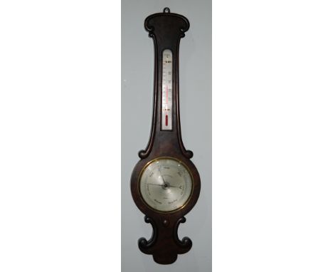 A 19th Century rosewood cased wheel barometer by Negretti & Zambra London incorporating a thermometer within scroll frame, he