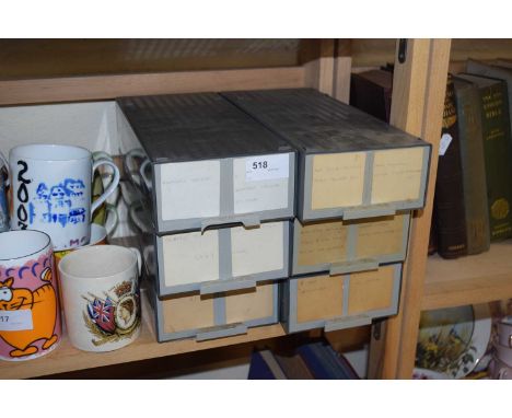 Six boxes of projector slides