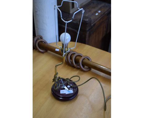 A brass based table lamp