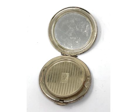 A silver compact