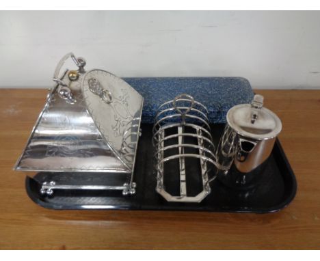 A tray containing plated wares to include an antique good quality plated caddy on ball feet, toast rack, teapot, together wit
