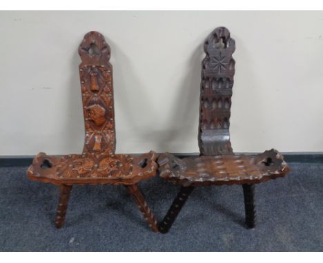 Two rustic pine tripod chairs, one with tooled leather seat and back  