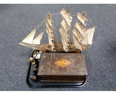 A tray of wooden table box, miniature brass miner's lamp, two carved resin figures of mice, wooden galleon and a tin of Eliza