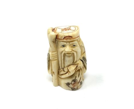 A carved Chinese bone netsuke - Elderly Gentleman with staff