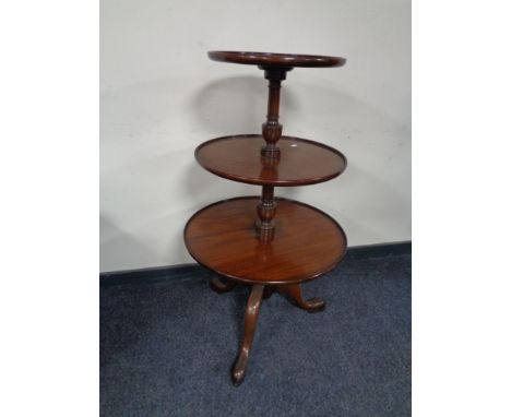 A Chapman's Siesta three tier circular dumb waiter on tripod stand 