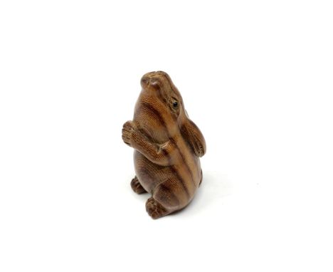 A carved Chinese hardwood netsuke - Rabbit