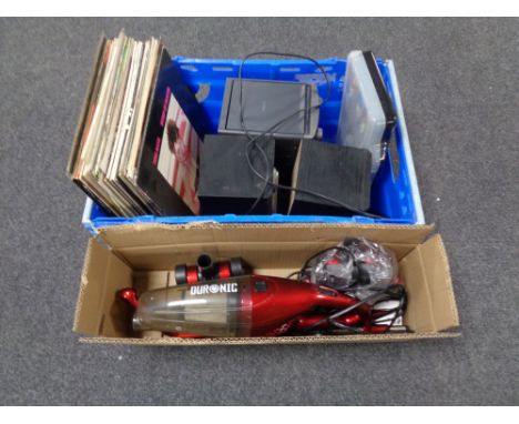 A box containing Philips Micro Hi-Fi system, cased screwdriver set, a stick vacuum together with a small quantity of LPs, orc