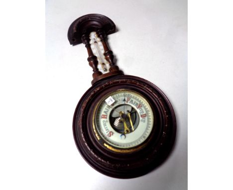 A barometer with enamel dial