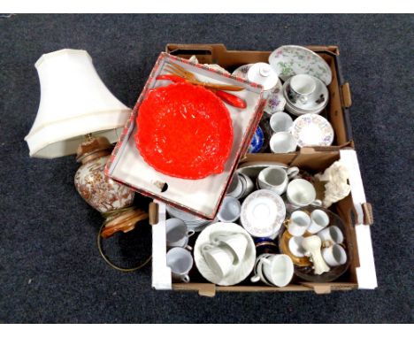 Two boxes containing miscellaneous tea china, figurines together with a boxed serving set and a table lamp with shade 