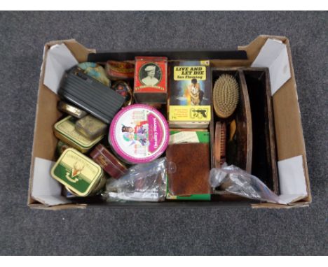 A box containing vintage tins, eight Pan paperback James Bond novels, coinage, clothes brushes, wooden caddy, pens etc   