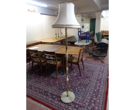 A brass and onyx standard lamp with shade 