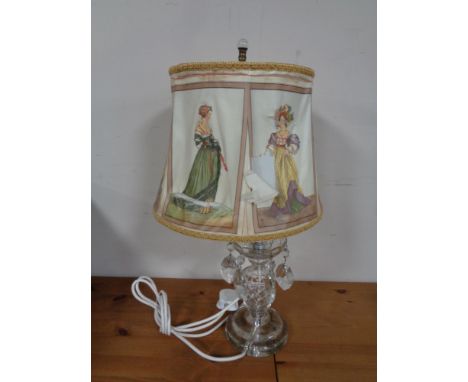 A cut glass table lamp with glass drops and shade  