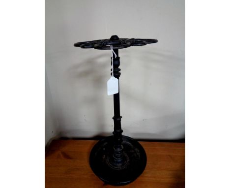 A 19th century circular cast iron stick stand 