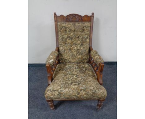 An Edwardian carved beech gentleman's armchair upholstered in a buttoned tapestry fabric, together with an antique dining cha
