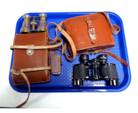 A tray containing a leather cased Zenith stereo, field glasses, pair of opera glasses together with a leather cased Kodak cam