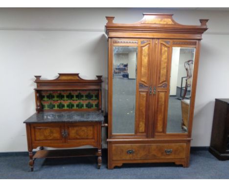 A mahogany and walnut three piece Arts &amp; Crafts bedroom suite comprising of double mirror door wardrobe fitted drawer ben