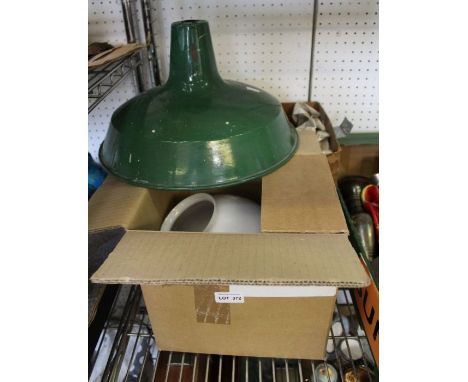 A selection of various shaped lampshades with one green enamel lampshade