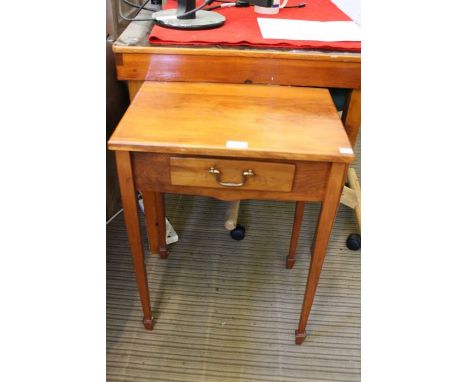 A yew wood lamp table with drawer