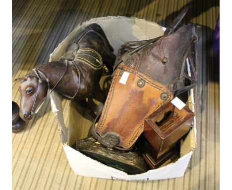 A box of items, includes pit pony head collar, statue, miniature longcase clock for pocket watch, model horse