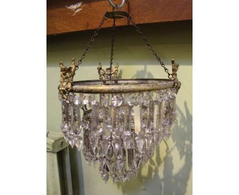 A faceted glass lustre three ring shade