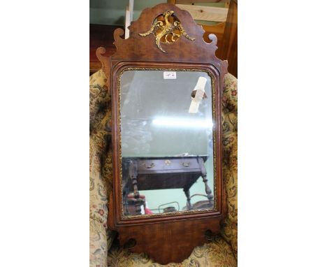 A Georgian design mahogany fret cut wall mirror, having gilded Ho-Ho bird over plain plate