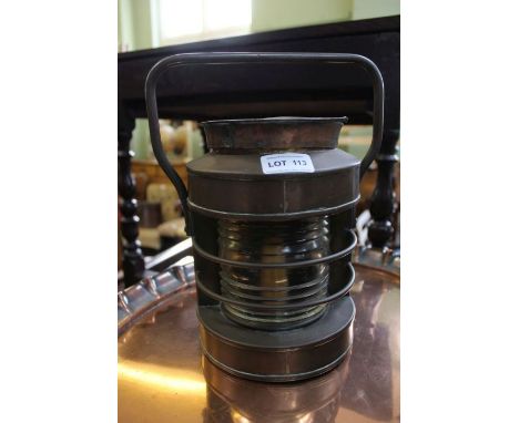 A copper lamp of Ships lantern design