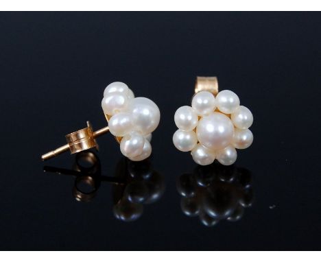 A pair of yellow metal and cultured pearl set flower head ear studs 