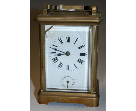A circa 1900 French brass carriage clock having subsidiary dial (with damages)