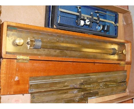 A Hilger & Watts Ltd of London boxed brass draughtsman's rule, together with watchkeeper's navigation instrument and a Allbri