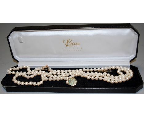 A Lotus Royale simulated pearl necklet, boxed