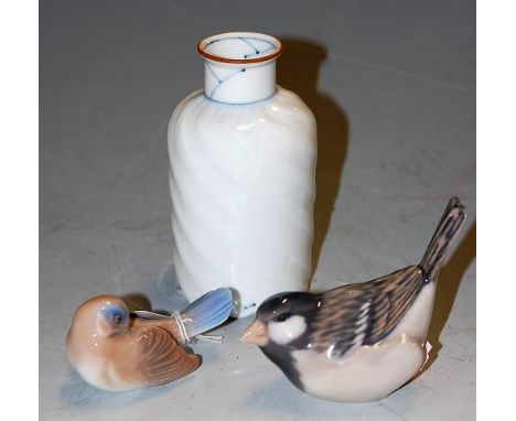A Bing & Grondahl miniature glazed ceramic model of a dove, together with a similar example by Copenhagen, and a contemporary