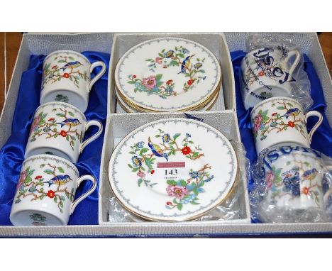 A set of six Aynsley Pembroke bone china coffee cans and saucers housed in a fitted box