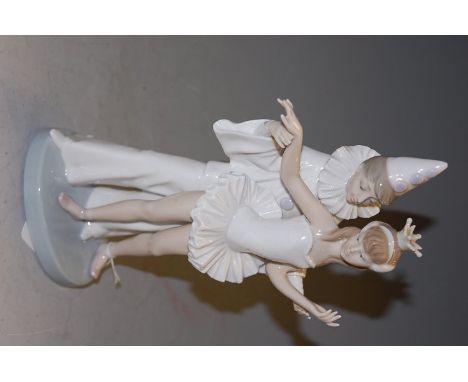 A Lladro glazed ceramic figure group of Pierrot with ballet dancer, height 26.5cm