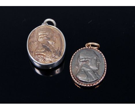 A reproduction silver pendant medallion, depicting profile portrait of Napoleon; together with a gold backed example (2) 