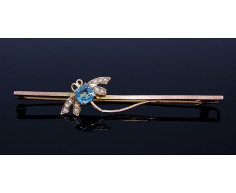 A 9ct gold blue topaz and seed pearl set bar brooch, early 20th century, 4g, 7,.6cm