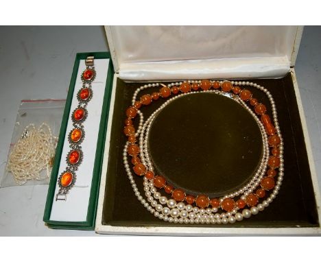 A faux pearl necklace together with amber set silver bracelet etc