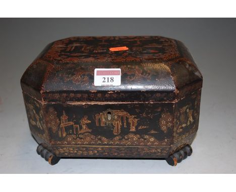 A late 19th century Chinese black lacquer octagonal hinge top tea caddy fitted with interior lidded pewter canisters, width 2