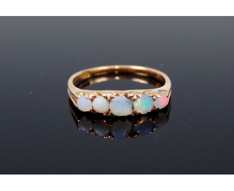 An 18ct gold opal set dress ring, 2.5g, size L+