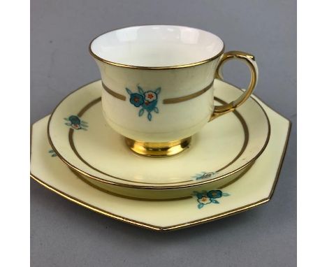 PARAGON PART TEA SERVICE, decorated with small flowers and gilt detailing on a yellow ground, comprising six cups, eight sauc