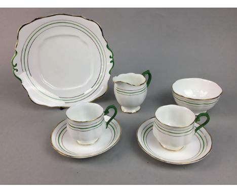 CROWN CHINA PART TEA SERVICE, comprising ten cups, twelve saucers, eleven side plates, two sandwich plates, sugar and cream, 