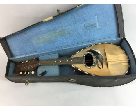 19TH CENTURY ITALIAN MANDOLIN, in case, along with a child's violin with bow, in case and two violin cases