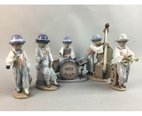 FIVE LLADRO FIGURES TO FORM A BAND, comprising a drummer, clarinet player, saxophonist, double bass player and trumpet player