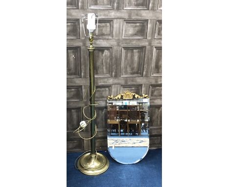 BRASS STANDARD LAMP, 130cm high, along with a gilt topped wall mirror (2)