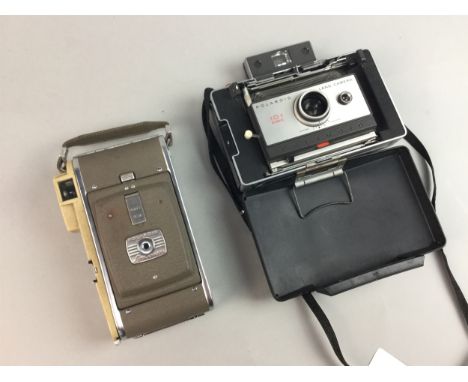 POLAROID LAND CAMERA MODEL 80A, in leather carry case, along with a Polaroid Automatic 101, with manual, and a Polaroid flash