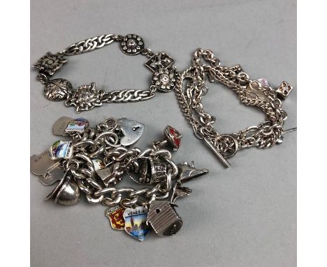 SILVER CHARM BRACELET, with a collection of charms including helmet, basket, figure and enamelled flags, along with two other