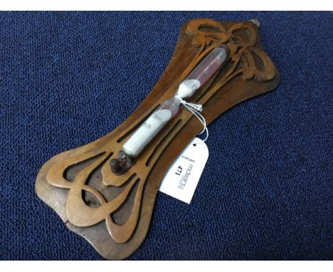 ART NOUVEAU STYLE HOURGLASS EGG TIMER, approximately 32.5cm long