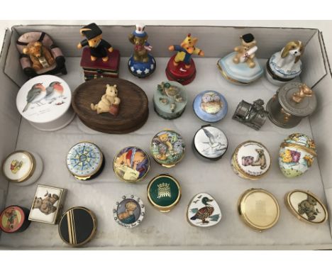 A quantity of 27 ceramic, enamel and metal ware lidded trinket pots and pill boxes. To include; Royal Worcester Days of the W