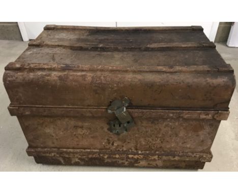 A vintage 2 handled tin trunk. Catch in need of attention. Approx. 70cm wide x 47cm tall.
