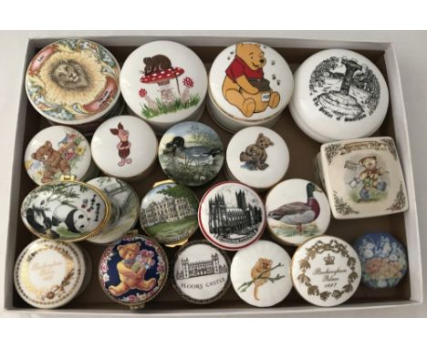 A quantity of 20 ceramic lidded trinket pots. To include; Wedgwood "Rambling Ted", Buckingham Palace souvenir pots and hand p