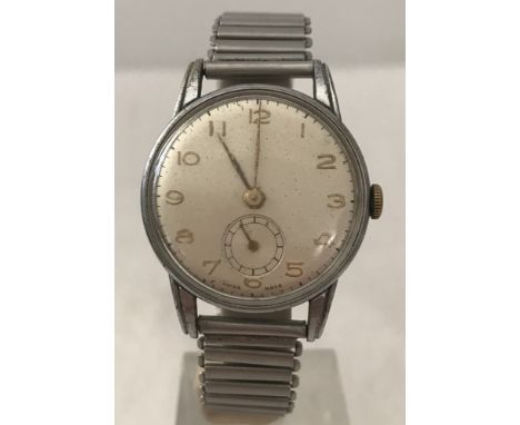 A mens vintage Fond Acier Inoxydable mens wristwatch with Bonklip strap.  